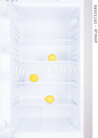 Lemon in empty clean refrigerator, inside Lemon in empty clean refrigerator, inside 39733086