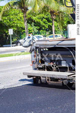 Pavement truck laying fresh asphalt 39733305