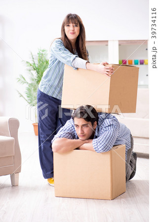 Young family moving in to new apartment after 39734116