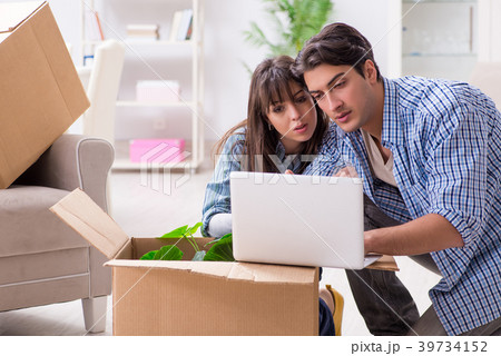 Young family moving in to new apartment after 39734152