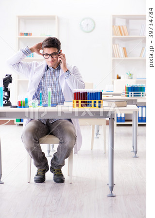Chemistry student doing chemical experiments at Chemistry student doing chemical experiments at 39734784