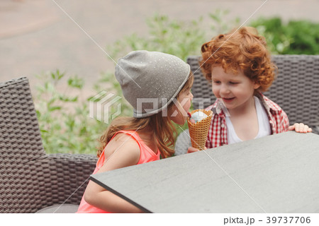 happy boy and girl with icecream 39737706