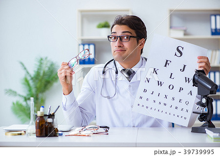 Eye doctor in medical concept Eye doctor in medical concept 39739995