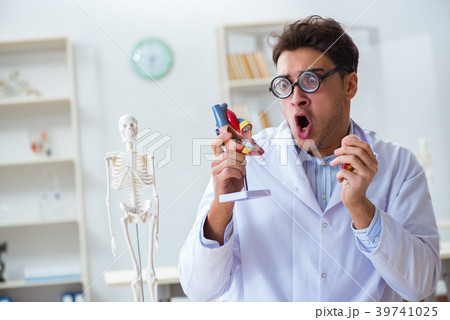 Crazy doctor with heart model 39741025