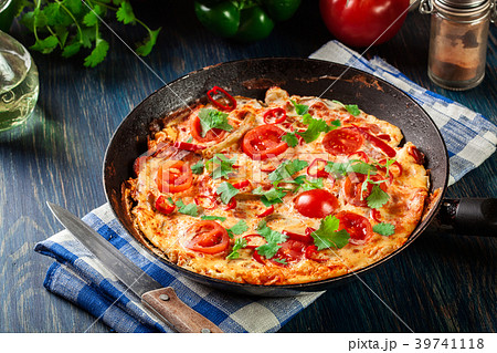 Portion of frittata with eggs, sausage chorizo 39741118