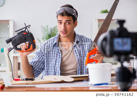 DIY blogger recording video of woorworking hobby DIY blogger recording video of woorworking hobby 39741162