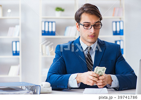 Businessman receiving his salary and bonus 39741786