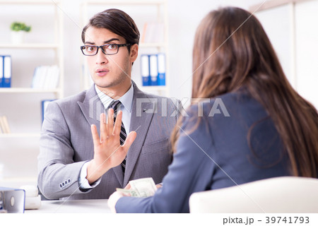 Businessmanbeing offered bribe for breaking law 39741793