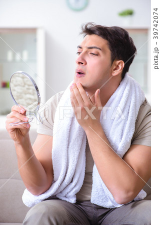 Man preparing to shave at home Man preparing to shave at home 39742074