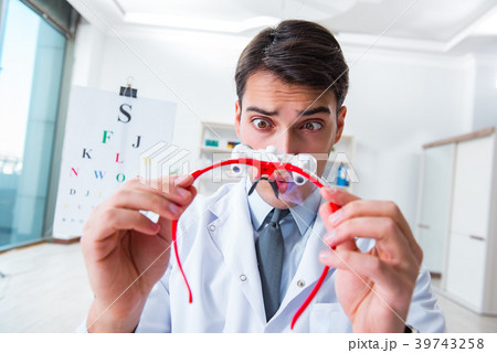Eye doctor in eyecare concept in hospital 39743258