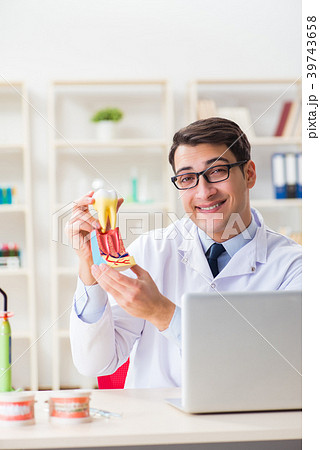 Young dentist working in the dentistry hospital 39743658