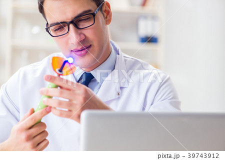 Young dentist working in the dentistry hospital Young dentist working in the dentistry hospital 39743912