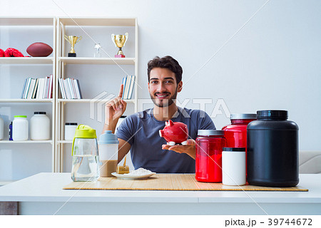 Athlete tasting new protein supplements for better 39744672