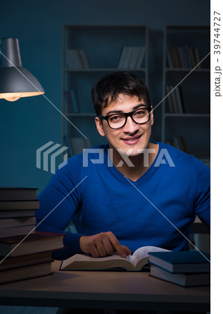 Student preparing for exams late at night in Student preparing for exams late at night in 39744727