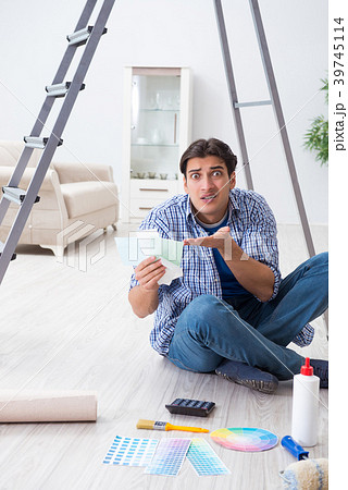Young man overspending his budget in refurbishment 39745114