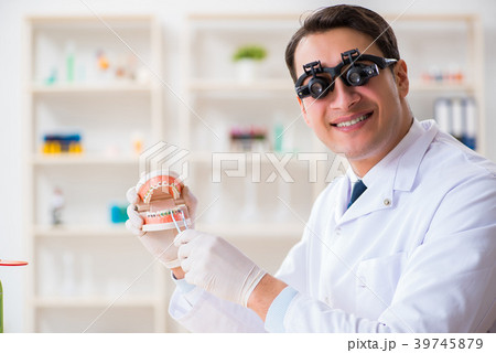 Young dentist working in the dentistry hospital 39745879