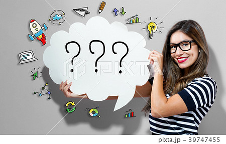 Question Marks text with woman holding a speech 39747455