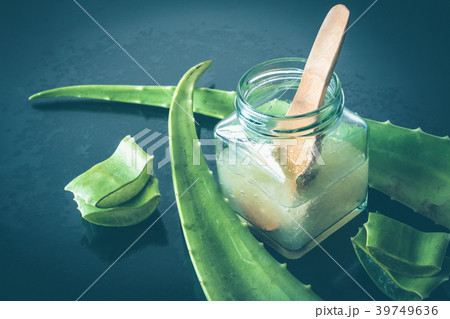 Fresh aloe vera and jelly in glass bottle 39749636