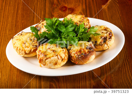 Stuffed champignon with cheese Stuffed champignon with cheese 39751323