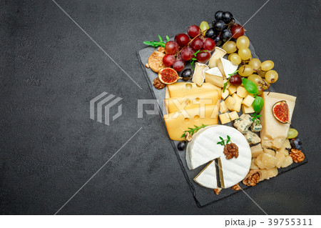 various types of cheese on stone serving board various types of cheese on stone serving board 39755311