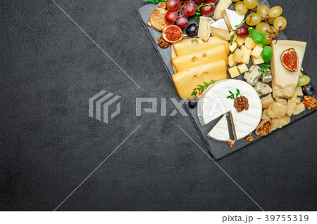 various types of cheese on stone serving board various types of cheese on stone serving board 39755319