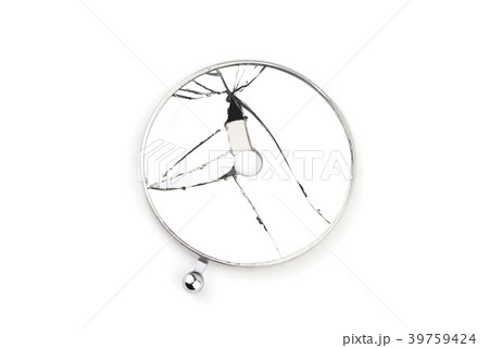 Broken round medical mirror 39759424
