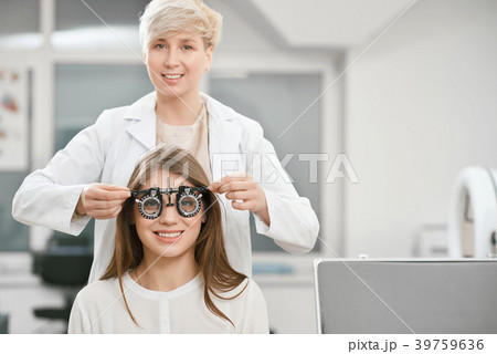 Frontview of young girl is sitting during vision 39759636