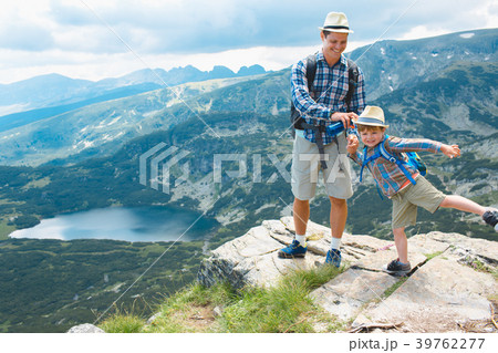 Father and son traveling in Rila mountains Father and son traveling in Rila mountains 39762277