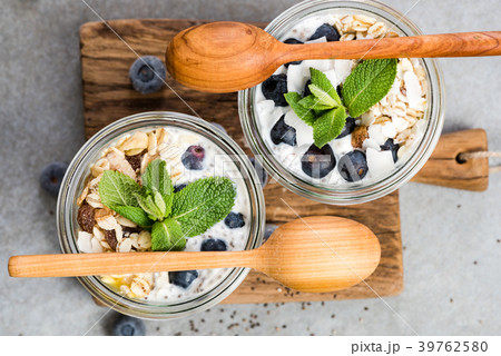 Blueberry and coconut musse layered in jar 39762580