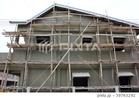 wooden scaffolding for new home under construction 39763292