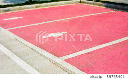 Bigger parking lot painted in pink for female 39763401
