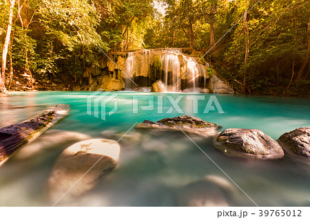 Beautiful stream tropical waterfall 39765012