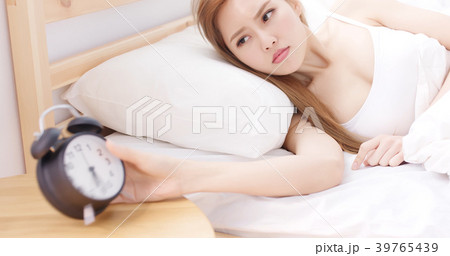 woman refusing to wake up woman refusing to wake up 39765439