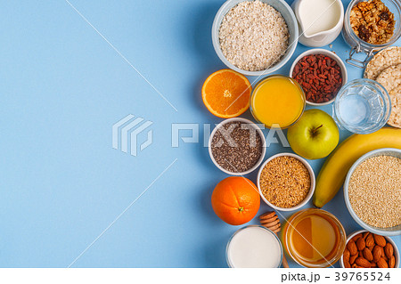 Useful breakfast on a blue pastel background Useful breakfast on a blue pastel background 39765524