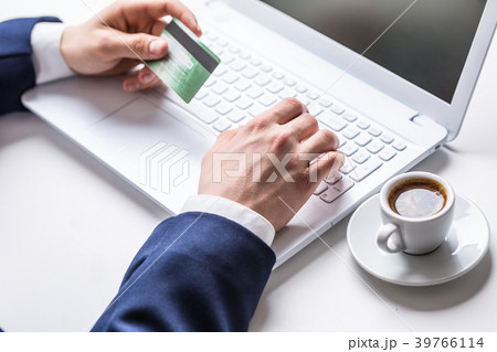 Man hands typing on the keyboard of laptop. 39766114