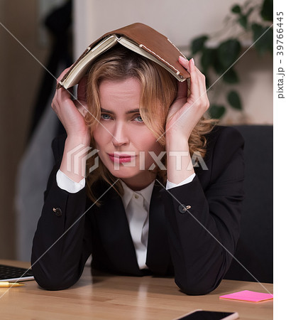 Young beautiful businesswoman is relaxing at Young beautiful businesswoman is relaxing at 39766445