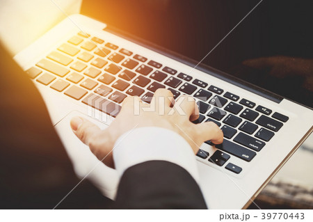 Silhouette of cropped shot of a young business man 39770443