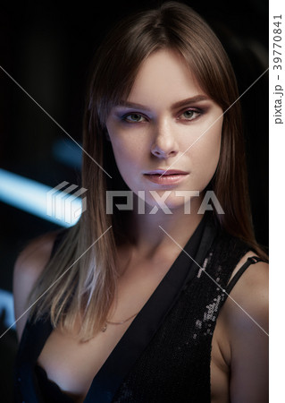 Beautiful girl stand at modern location. Portrait. Beautiful girl stand at modern location. Portrait. 39770841