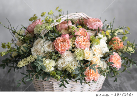 Beautiful flower composition a bouquet in a wicker Beautiful flower composition a bouquet in a wicker 39771437