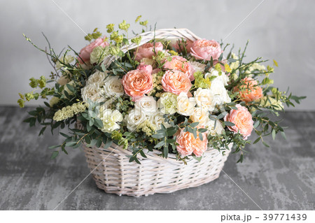 Beautiful flower composition a bouquet in a wicker Beautiful flower composition a bouquet in a wicker 39771439