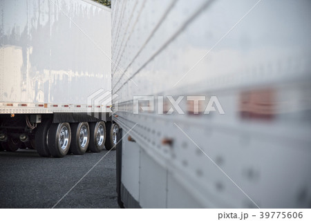 Truck trailers in the parking lot of a truck stop near Seattle, Washington, USA Truck trailers in the parking lot of a truck stop near Seattle, Washington, USA 39775606