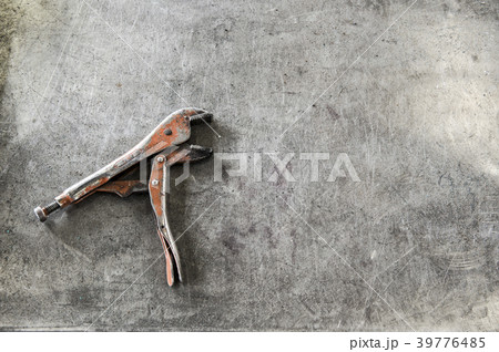 Closeup still life of tools used in a sheet metal factory. 39776485