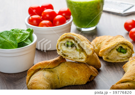 Mini Calzone roll with herbs and cheese 39776820