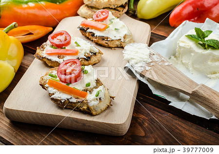 Healthy baguette, spread curd cheese with vegetable and herbs Healthy baguette, spread curd cheese with vegetable and herbs 39777009