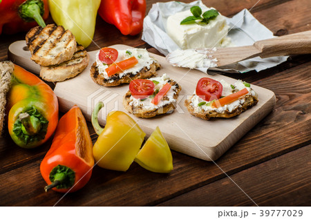 Healthy baguette, spread curd cheese with vegetable and herbs 39777029