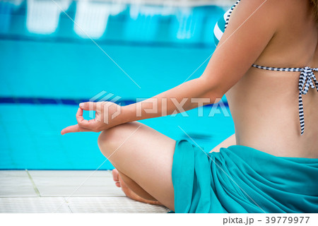 Woman in a swimming pool. Woman in a swimming pool. 39779977