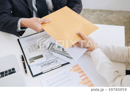 Bribery and corruption concept, bribe in the form of dollar bill Bribery and corruption concept, bribe in the form of dollar bill 39780959