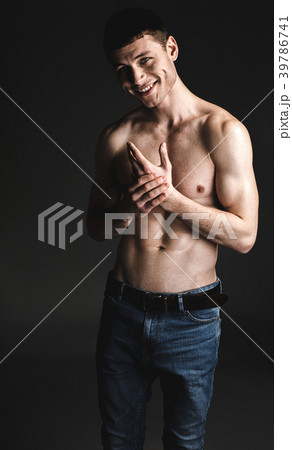 Outgoing male stripped to waist 39786741