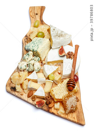 Camembert cheese with honey, figs, walnuts on Camembert cheese with honey, figs, walnuts on 39786803