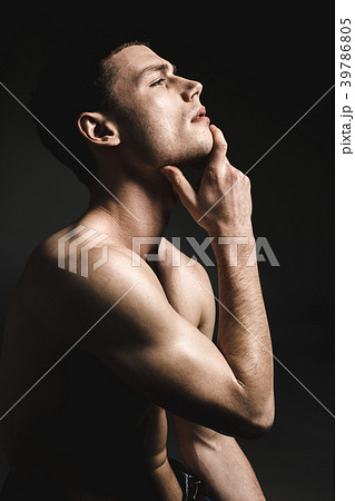 Undressed handsome male demonstrating abstraction 39786805